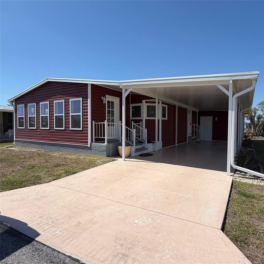 Step into this amazingly refurbished red home with crisp white trim, truly better than new and full of thoughtful upgrades throughout. From the moment you arrive, the charming front porch—featuring seven double-hung windows—invites you to relax and enjoy the Florida lifestyle.

Inside, you’ll find a stunning, state-of-the-art kitchen designed for both beauty and function, along with a spacious layout that includes an inviting living area and an impressive main ensuite bath. Every detail has been carefully updated, including a new electrical panel, fresh interior paint, and a new roof with warranty, offering peace of mind for years to come.

Additional highlights include inside laundry, a brand-new carport, and a convenient storage shed, making everyday living easy and efficient.

Located in the highly desirable Sandalwood Park, this community is known for its friendly atmosphere and active lifestyle. Residents enjoy a large heated and cooled pool, social gatherings, a dog park, and a variety of activities to stay engaged and connected.

Perfectly situated between Venice Avenue and Center Road, you’re just minutes from medical facilities, restaurants, shopping, and the beach. The park itself offers extra space between homes, adding to the sense of comfort and privacy.

This is a rare opportunity to own a beautifully updated home in one of the area’s most sought-after communities.