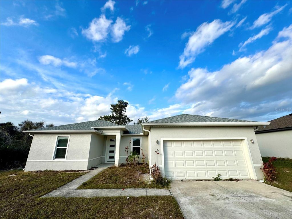 Photo of 9 Orchid Lane, Kissimmee, FL 34759 (MLS # O6384052)