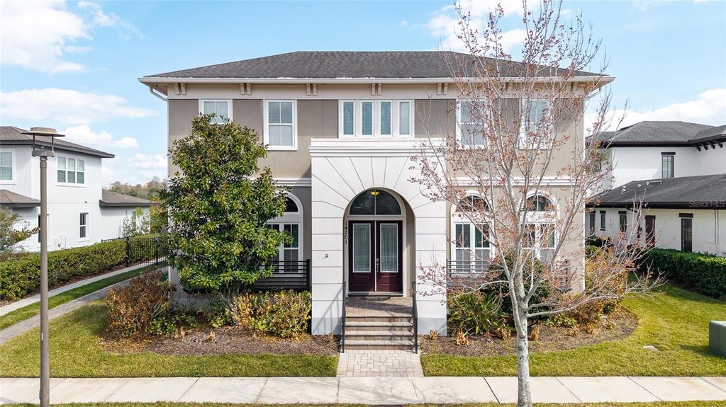 Photo of 14201 Corrigan Avenue, Orlando, FL 32827 (MLS # TB8481137)