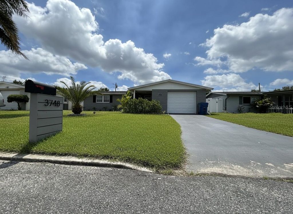 Photo of 3748 Beechwood Drive, Holiday, FL 34691 (MLS # TB8496197)