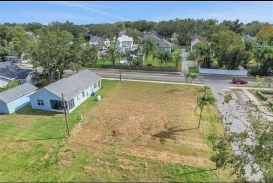 BEAUTIFUL ready to build corner lot near downtown Plant City! Just shy of a quarter of an acre, leveled and ready to build your dream home! City water and septic hookups available. Beautiful views and access to Courier Field park across the street. This wonderful lot is in a non-flood zone with no HOA or deed restrictions. Lot dimensions 75 X 116. Located close to dining, shopping, hospitals. Quick access to I-4 for easy commuting to Tampa or Orland. Exciting theme parks such as Disney, Disney Springs, Universal, Islands of Adventures are right at your fingertips. Come tour this lovely piece of property today!