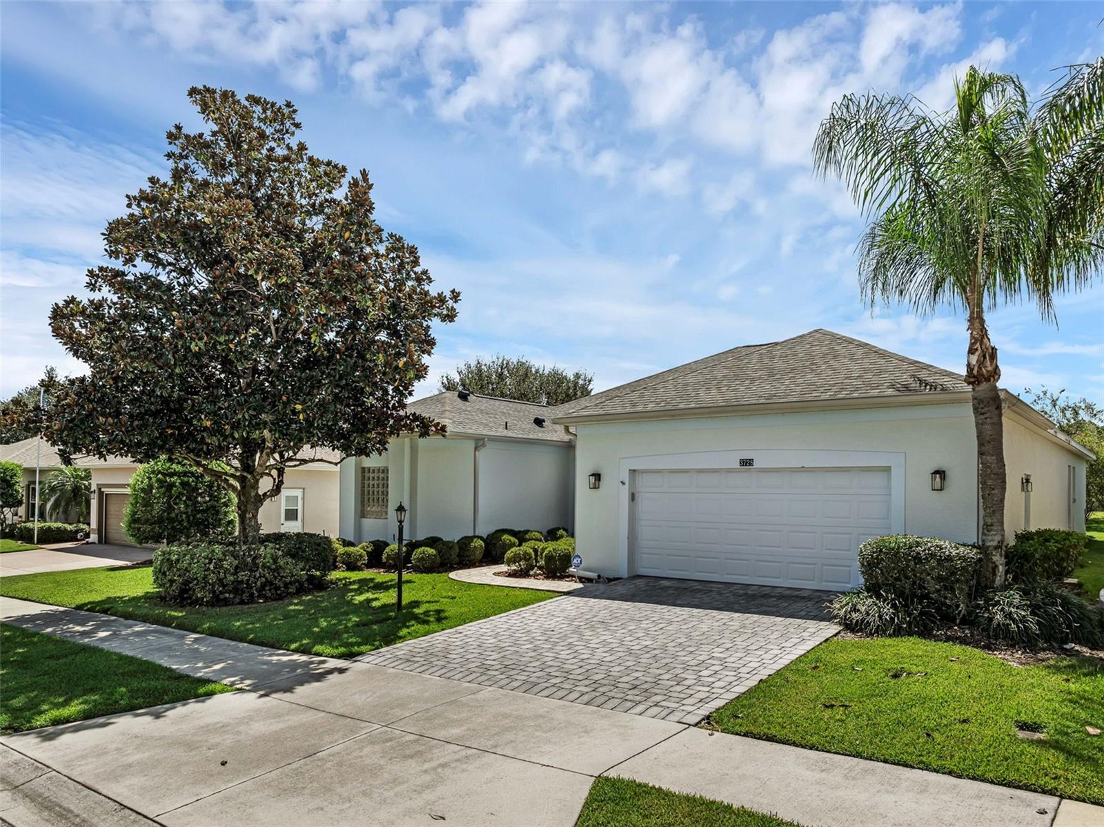 Downsize Without Downsizing! POOL HOME in Sunny Florida! This beautifully maintained 3-bedroom, 2-bath split floor plan with a separate Study/Flex space offers all the room you need without compromising comfort. The open layout flows easily, highlighted by a spacious kitchen that’s a COOK'S DREAM—loaded with cabinets, abundant counter space WITH UNDER COUNTER LIGHTING for holiday baking, neutral appliances, and a brand-new dishwasher. A clever conversion turned the half bath into an EXTRA LARGE PANTRY, adding valuable storage just steps from the kitchen. The INSIDE LAUNDRY features UPGRADED WASHER & DRYER with LAUNDRY SINK, and additional cabinetry for convenience. The OVERSIZED OWNER'S SUITE is a retreat with TWO LARGE WALK-IN CLOSETS and a SPA-LIKE EN-SUITE featuring DUAL VANITIES, a STEP-IN SHOWER, separate water closet, and a LUXURIOUS WALK-IN TUB. The SPLIT FLOOR PLAN gives guests privacy with two additional bedrooms on the opposite side of the home, while the Study/Flex space (no closet) is perfect for an office, hobby room, or den. Step outside to enjoy the huge enclosed lanai that extends your living space, overlooking the EXPANSIVE SCREENED IN POOL with a LARGE DECK—ideal for entertaining, sunbathing, gardening, or game-day gatherings. Established landscaping enhances the curb appeal while offering privacy. Major updates add peace of mind: ***ROOF (2022), AC (2023), Water Heater (2023)***. Located in the sought-after Plantation at Leesburg, a premier 55+ community, enjoy resort-style living with golf, tennis, pickleball, three clubhouses, pools, fitness, and a packed calendar of activities. This home combines space, updates, and lifestyle in one incredible package—schedule your showing today!