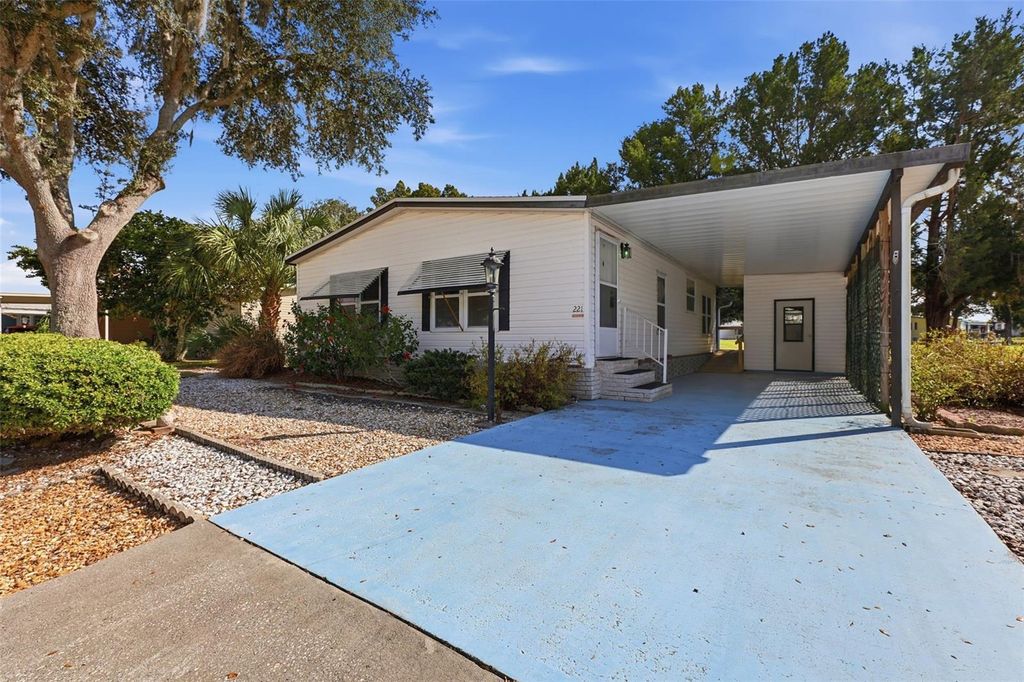 Photo of 221 Covent Garden Avenue, Davenport, FL 33897 (MLS # O6362583)