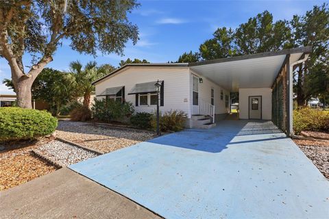 Photo of 221 Covent Garden Avenue, Davenport, FL 33897 (MLS # O6362583)