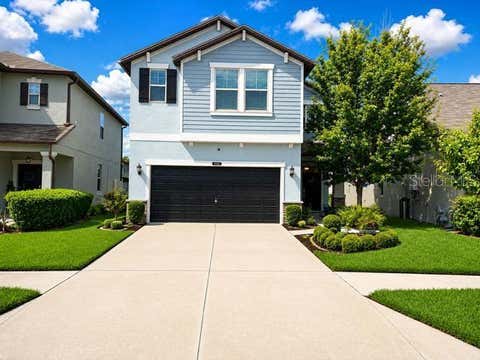 Photo of 8913 Flourish Drive, Land O Lakes, FL 34637 (MLS # TB8525843)