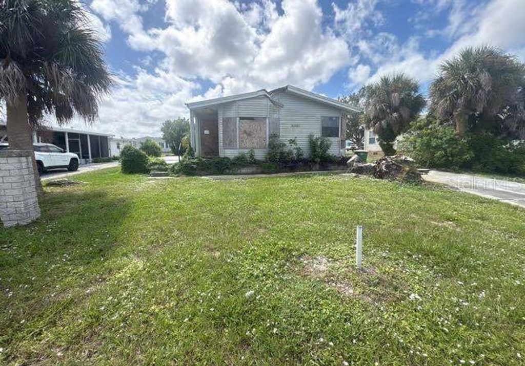 Photo of 8407 Buttonquail Drive, Englewood, FL 34224 (MLS # O6353336)