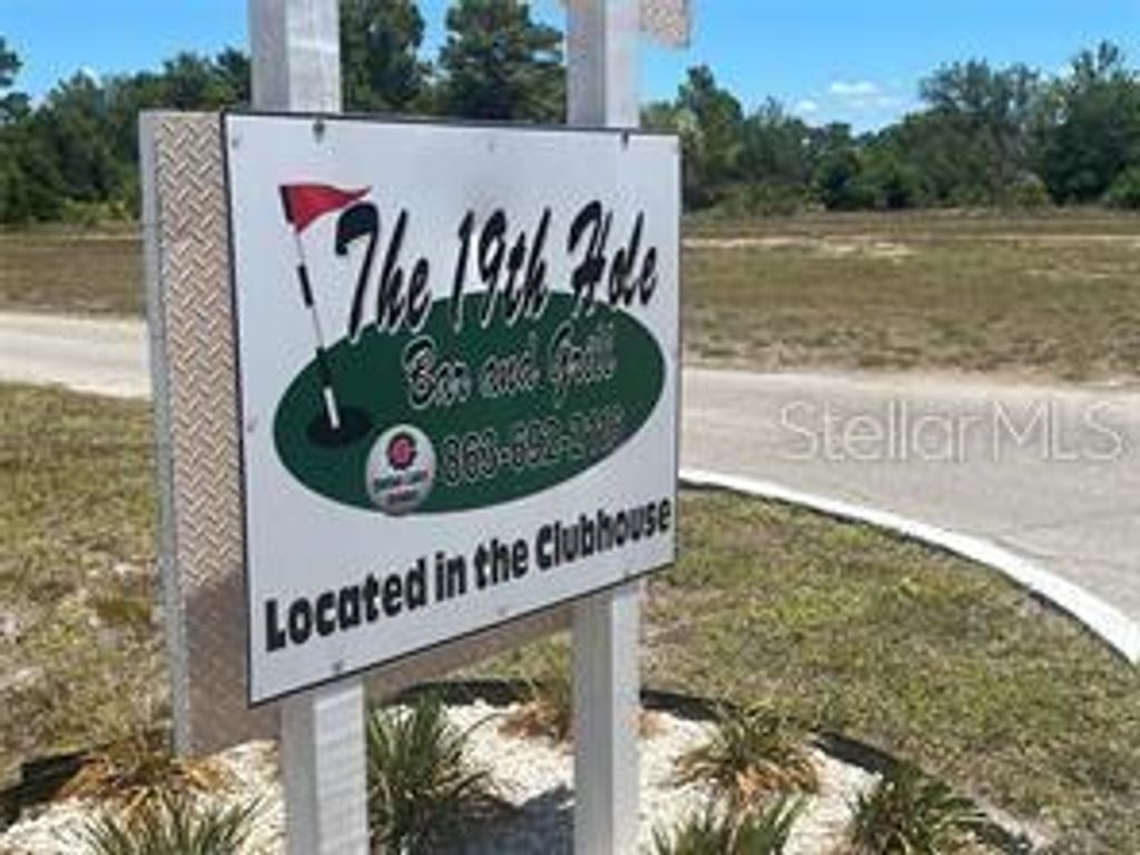 Photo of 918 Japonica Drive, Indian Lake Estates, FL 33855 (MLS # TB8439937)