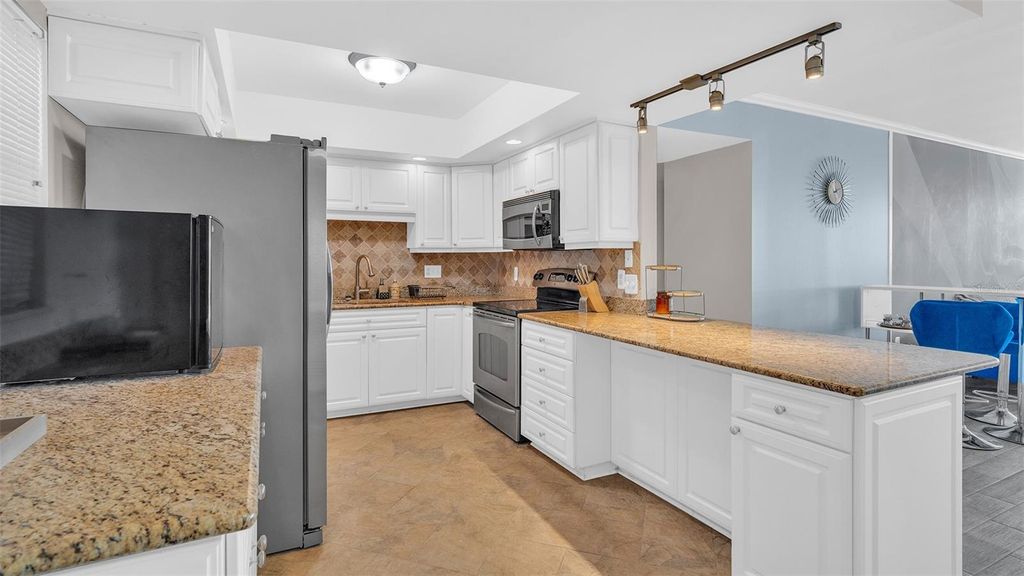 Photo of 5130 Brittany Drive S #507, St Petersburg, FL 33715 (MLS # TB8485132)