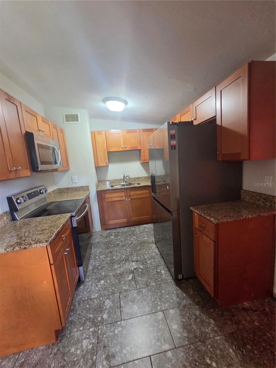 Photo of 916 E 123rd Avenue, Tampa, FL 33612 (MLS # TB8543653)