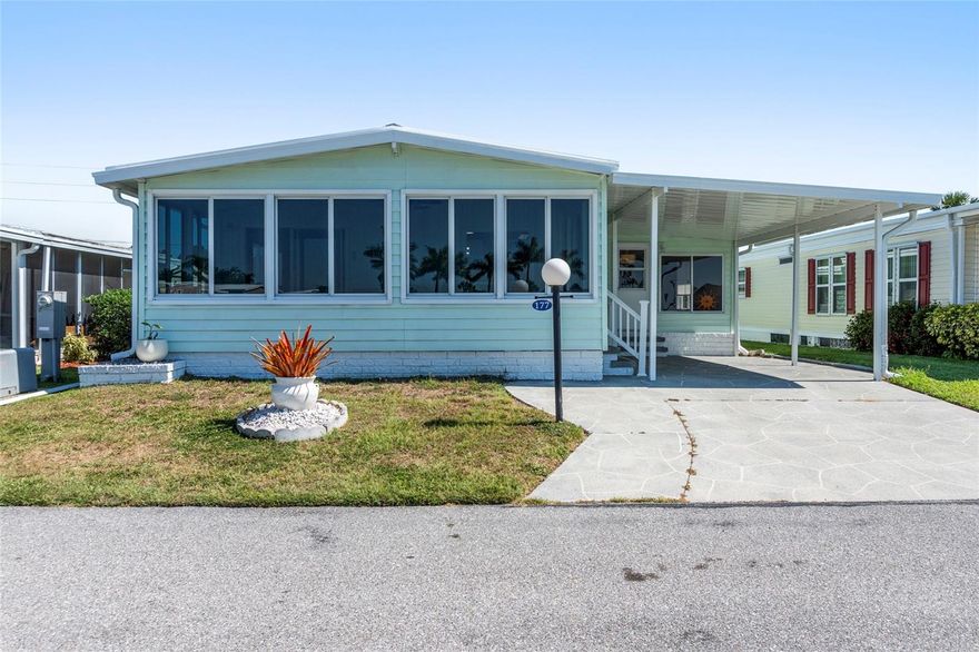 Welcome to Lazy River Village — one of the most sought-after 55+ waterfront communities in both Sarasota and Charlotte Counties! Nestled along the beautiful Myakka River, this vibrant community is known for its incredible amenities, active lifestyle, and endless activities that truly make Florida living special.
This beautifully renovated home offers approximately 1,427 square feet of air-conditioned living space, including the lanais, and has been thoughtfully updated from top to bottom. The spacious kitchen features gorgeous quartzite countertops, solid wood cabinetry, a large island with tons of storage, and an open feel perfect for entertaining.
One of the standout features of this home is the TWO insulated, air-conditioned, and carpeted lanais, giving you endless possibilities for extra living space — whether you need a home office, craft room, game room, or relaxing sitting area.
Additional updates include:
• Brand new carport
• New roof
• A/C replaced in April 2023
• Luxury vinyl plank flooring throughout with ¾" plywood subflooring
• Freshly painted vinyl siding for added curb appeal
• Walk-in closets with motion-detection lighting
The peaceful lake view from the front entrance creates a relaxing atmosphere, and the fountain even lights up with changing colors at dusk for an extra touch of charm.
Whether you're looking for the perfect seasonal getaway or a full-time Florida home, this property offers the best of both worlds. Lazy River Village is packed with amenities and activities including pickleball, tennis, biking clubs, card clubs, pontoon boating, and even a professional woodworking shop. The low monthly fee of just $276 includes access to the incredible amenities, with optional extras such as marina slips available.
Location is another huge bonus — you're close to shopping, dining, beaches, nature preserves, and some of Florida’s best wildlife. Plus, both the Atlanta Braves and Tampa Bay Rays spring training facilities are just minutes away!
If you’ve been dreaming of an active Florida lifestyle in a beautifully updated home, this one is a must-see!