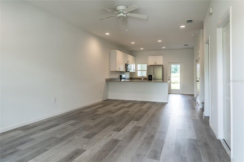 Photo of 5341 Vista Lago Drive, Orlando, FL 32811 (MLS # O6424750)