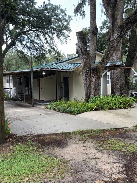 Photo of 20930 NE 142nd Place, Salt Springs, FL 32134 (MLS # OM707091)