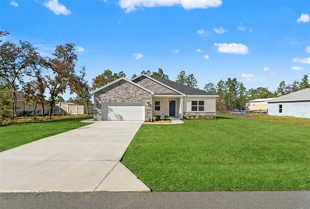 Photo of 15171 Pomp Pkwy, Weeki Wachee, FL 34614 (MLS # TB8460498)