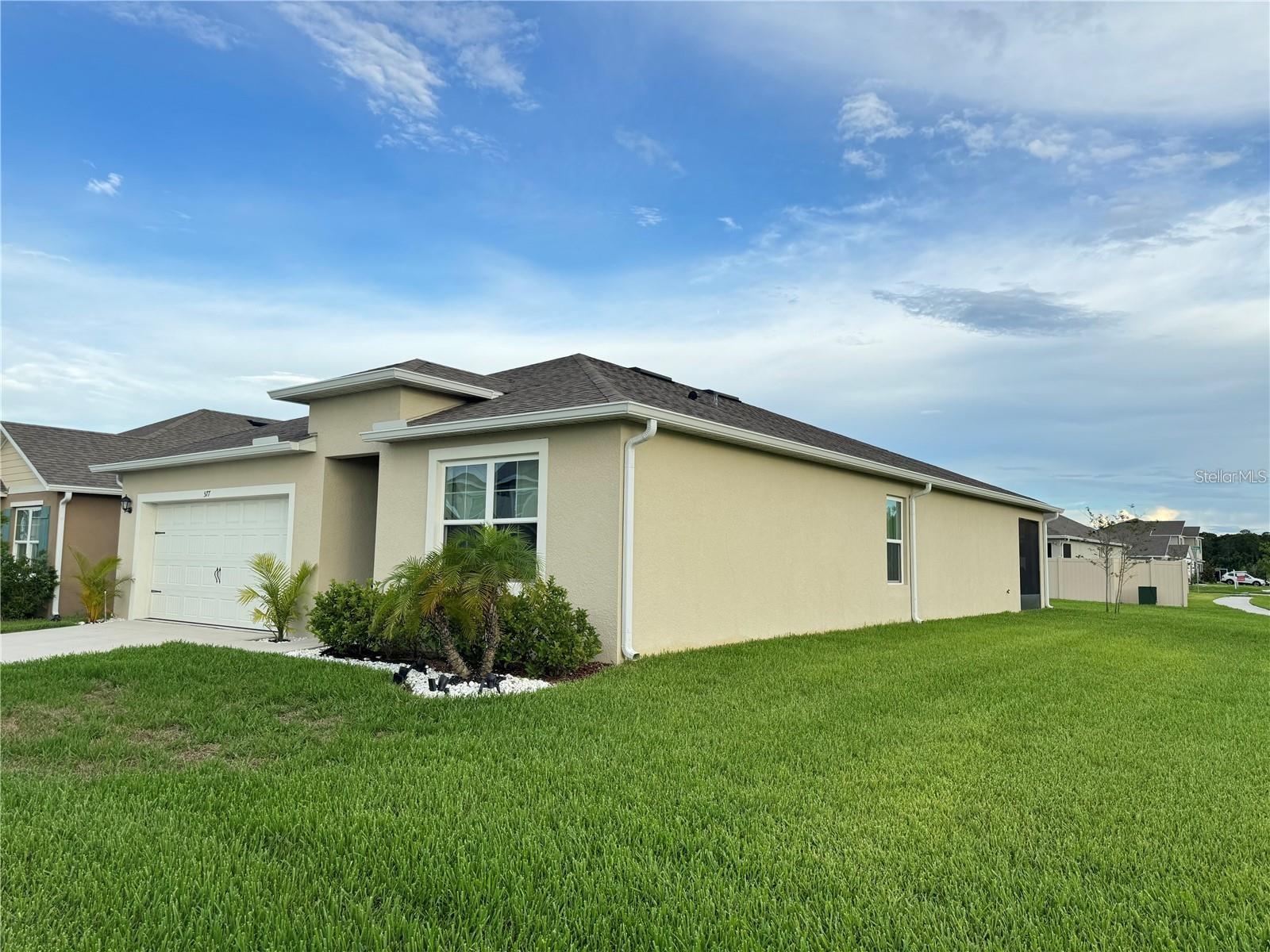 Welcome to your future home in the desirable Summerly community with low HOA and NO CDD!!! This beautifully maintained, 3-year-old residence sits on a spacious CORNER lot, just steps from a neighborhood park and resort-style community pool. Featuring 4 generously sized bedrooms and 2 full bathrooms, this home offers an open-concept layout that blends comfort and functionality—perfect for everyday living and entertaining. The spacious master suite includes a private bath and oversized walk-in closet. Gutters installed! Conveniently located just minutes from shopping, top-rated schools, Building Brains Academy, and the cutting-edge Lake Nona medical district—including Nemours Hospital, VA Medical Center, and UCF Lake Nona Hospital. Whether you're looking for a peaceful retreat or close proximity to vibrant city life, this home checks all the boxes. Don’t miss this opportunity—schedule your private showing today!