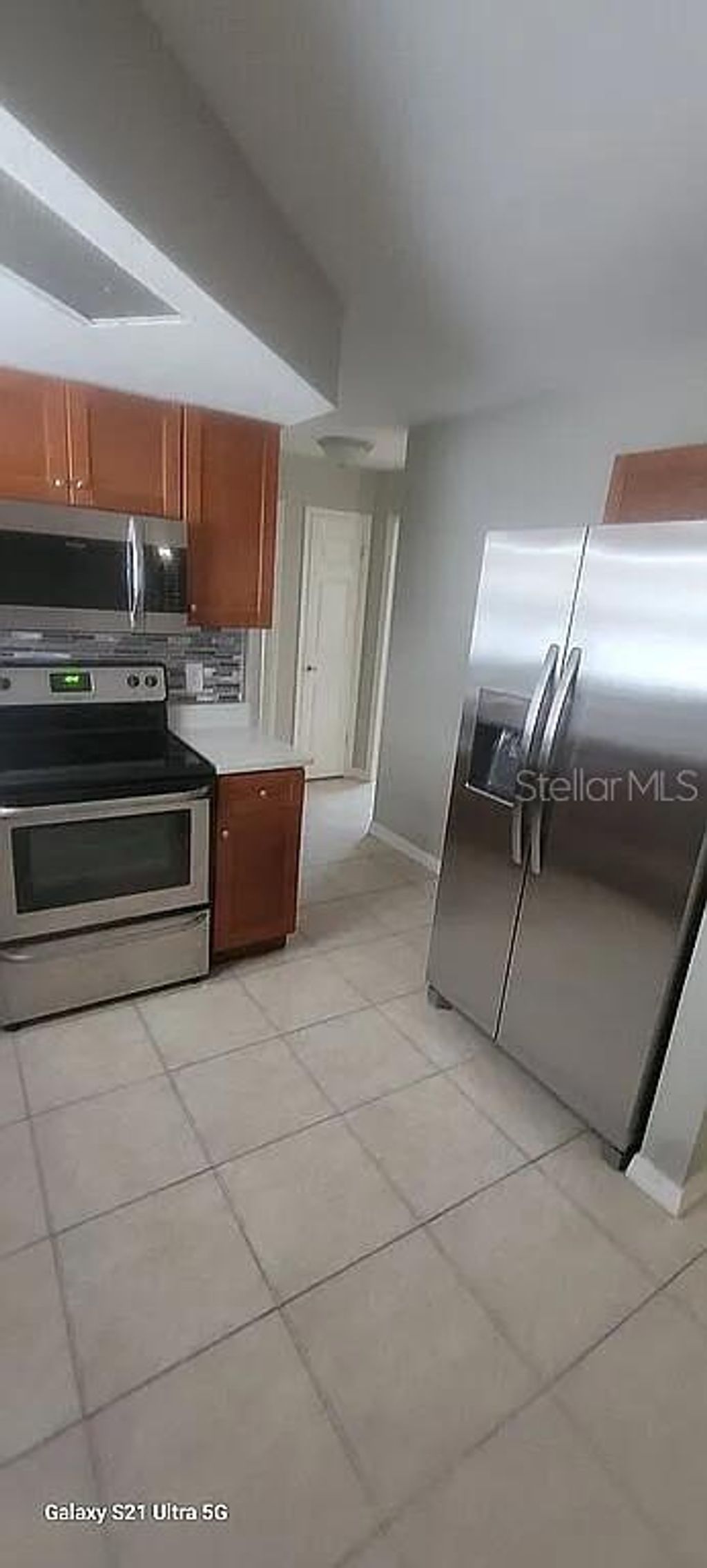 Photo of 9901 Woodstock Lane, Port Richey, FL 34668 (MLS # O6392565)