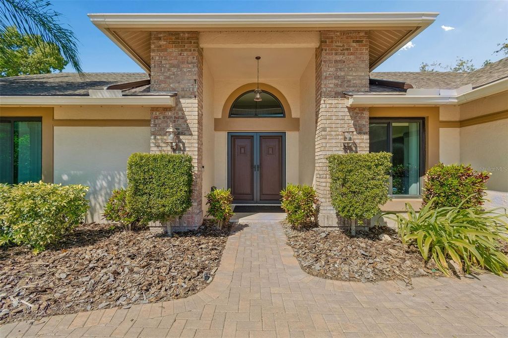 Photo of 8723 Ashbury Drive, Hudson, FL 34667 (MLS # TB8498803)