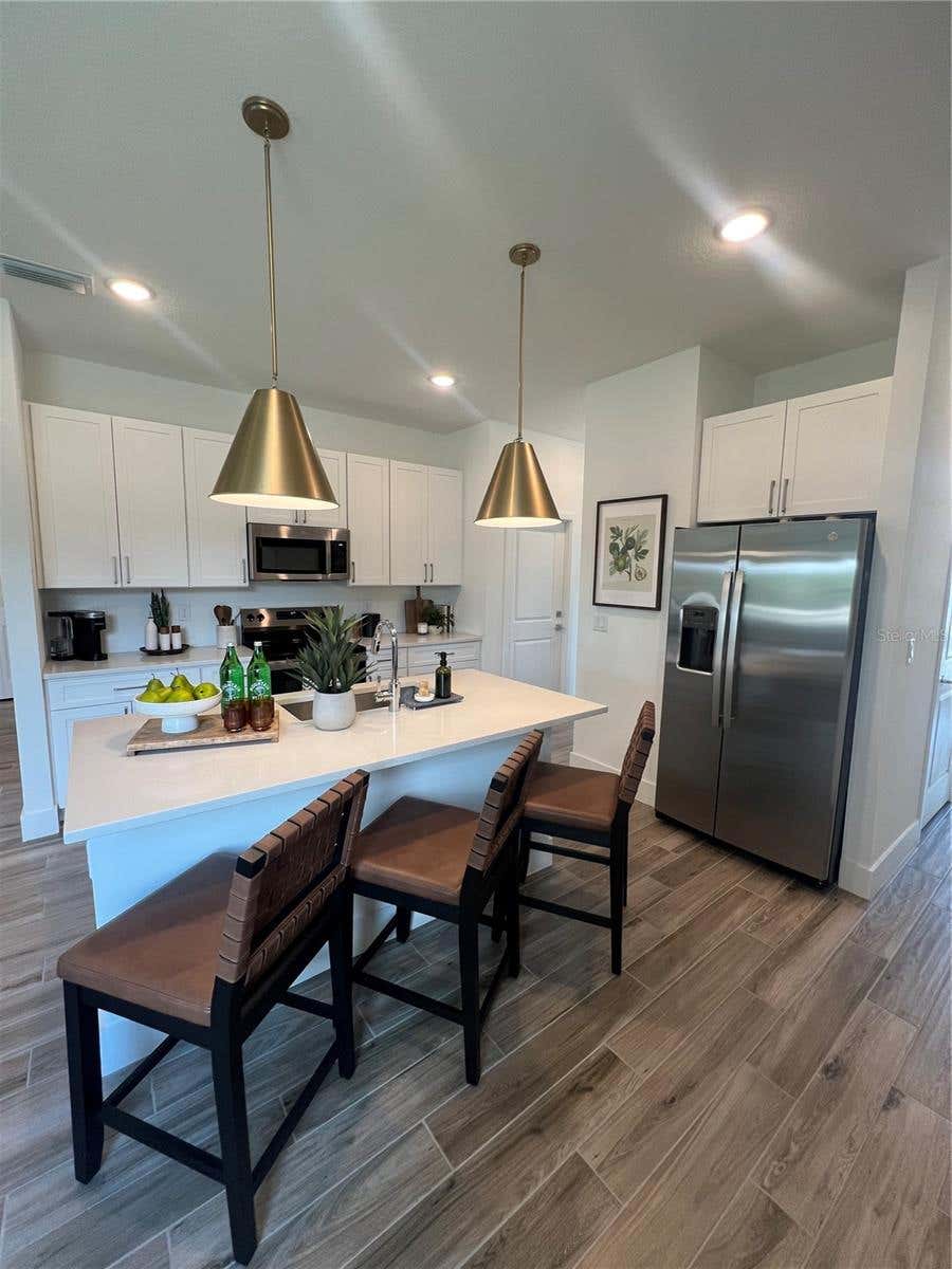 Photo of 101 Elena Lavin Circle, Orlando, FL 32807 (MLS # O6430683)