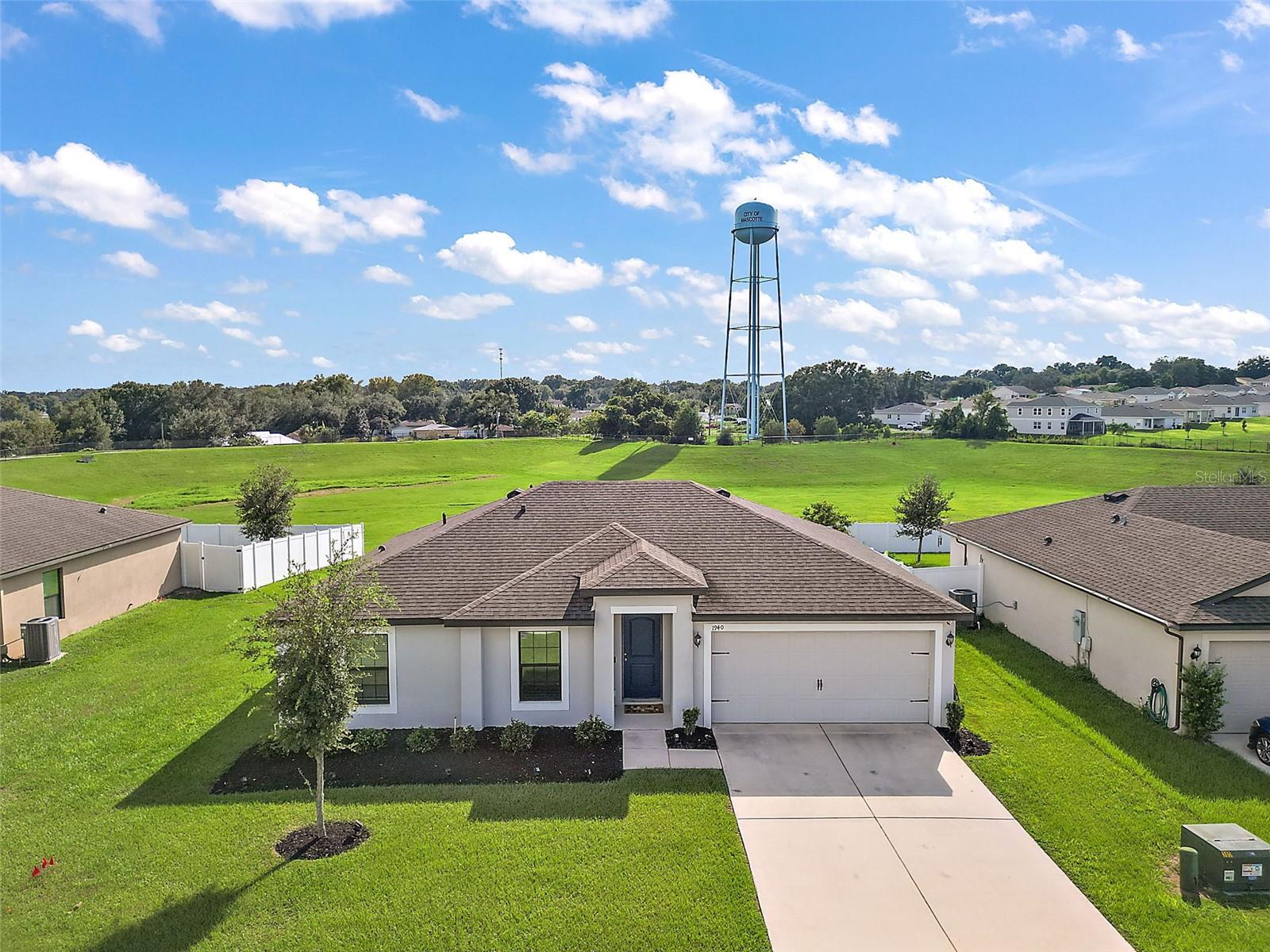This home is in a perfect location, tucked away in the Lake Jackson Ridge community. It has three bedrooms, two bathrooms, a really cute and cozy open floor plan, and sits on an enormous lot with wait for it NO near neighbors. This home has an attached garage, energy-efficient Whirlpool appliances, brush nickel hardware, and beautiful granite countertops. Exceptional starter home split plan primany bedroom suite, away from other bedrooms for privacy. a dining area, a breakfast bar, and it has beautiful, low-maintenance landscaping. The home comes equipped with a security system and a whole-house water treatment system. The Lake Jackson Ridge neighborhood is a must-see starting point since it offers homeowners quick access to world-class amusement parks, parks, trails, conservation areas, and local shopping.