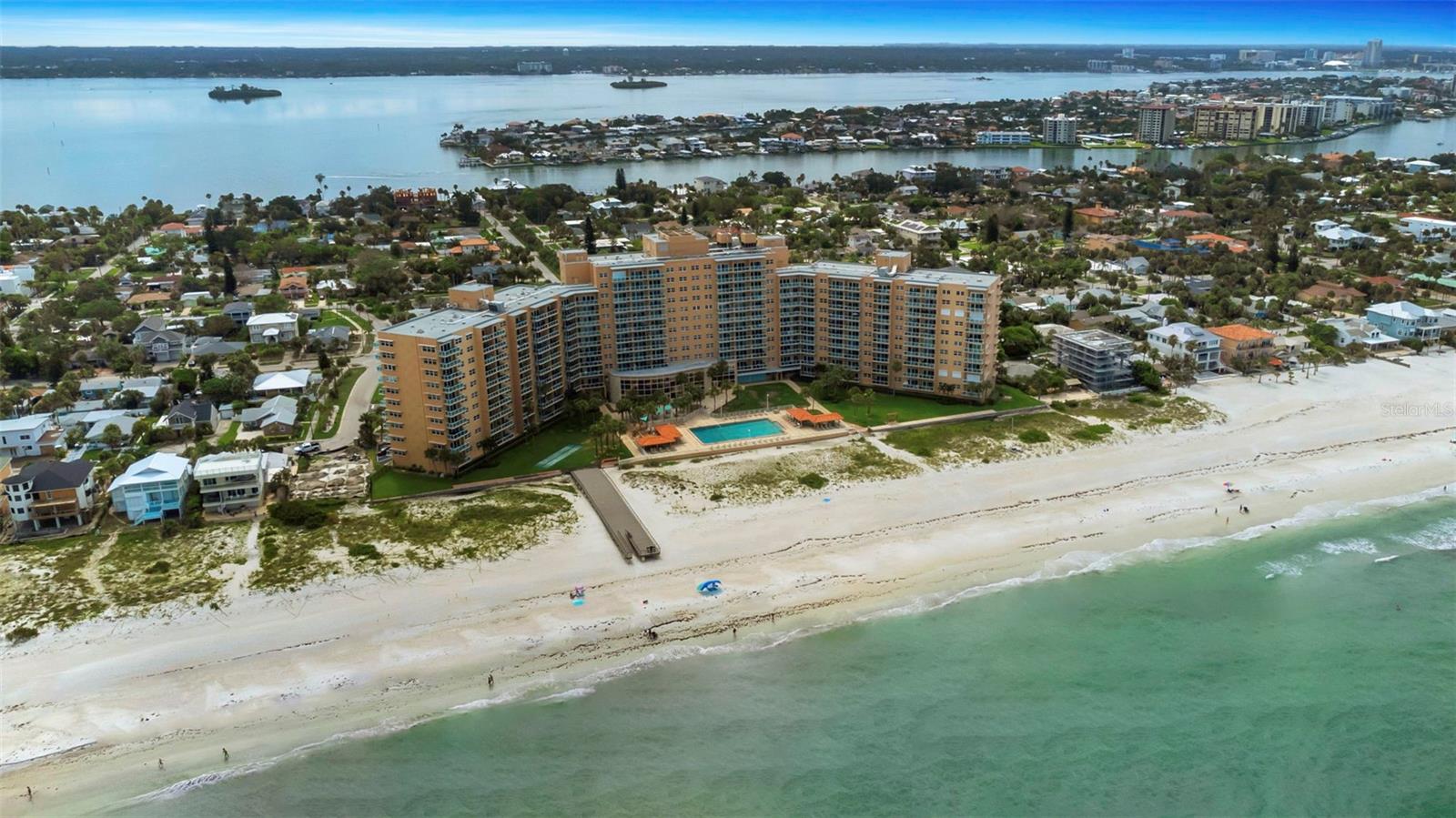 Top-Floor Luxury Penthouse! The Perfect Clearwater Beach Getaway! Don't miss this rare opportunity to stay in an amazing 12th-floor penthouse at the exclusive Regatta Beach Club-available starting September 1, 2025! Wake up to beautiful sunrise views over the bay from your private, covered balcony, and end the day with breathtaking sunsets on the sands of the North Clearwater Beach. This fully furnished 2-bedroom, 1 bath condo features 1,090sq.ft., a spacious open layout with elegant, luxury finishes and plenty of closet space. Whether you're dipping your toes in the sand, lounging by the heated Olympic-sized pool, or relaxing on the new boardwalk and pier, you'll have everything you need for the ultimate Florida escape. Amenities Included: a concierge and secured entry, a fitness center with ocean views, a game room, with pool and ping pong, a movie/theater room, a community lounge study room, shuffleboard courts, a propane BBQ grill area, and covered secured parking. It's just 1 mile from Clearwater Beach top restaurant, shops, and nightlife, and walking distance to Caladesi Island State Park. Hop on the Jolly Trolley right at the building for easy access around town! A 3-month minimum stay is required, and if you stay for 6 months and a day (or more) then you don't need to pay a tourism tax. Listing agent is one of the owners.