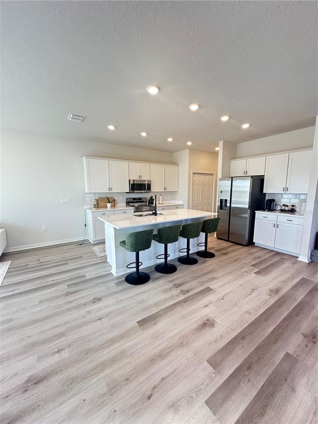 Photo of 452 Huckleberry Blossom Drive, Saint Cloud, FL 34771 (MLS # O6352621)