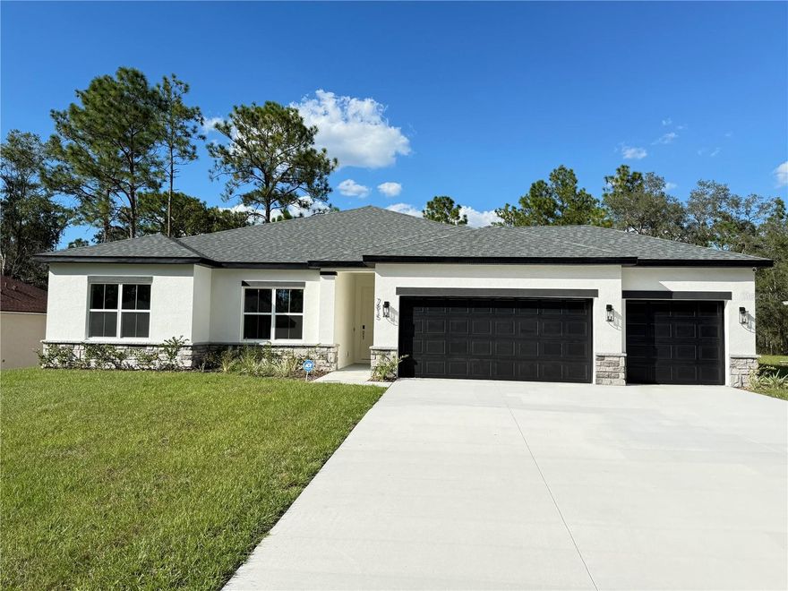 Be the first to live in this brand-new 4-bedroom, 3-bath home located in the desirable Marion Oaks community! This beautiful property offers a modern open floor plan with no carpet — luxury vinyl flooring flows seamlessly throughout the entire home. The spacious kitchen is truly one to fall in love with, featuring quartz countertops, stainless steel appliances, and a large island perfect for entertaining. The primary suite includes a walk-in closet and a stylish bathroom with dual sinks and a walk-in shower. Enjoy outdoor living on the huge covered lanai, perfect for relaxing or hosting gatherings. With a 3-car garage, elegant finishes, and a bright, airy layout, this home offers both comfort and sophistication. Conveniently located near shopping, dining, and main highways — move-in ready and waiting for you!