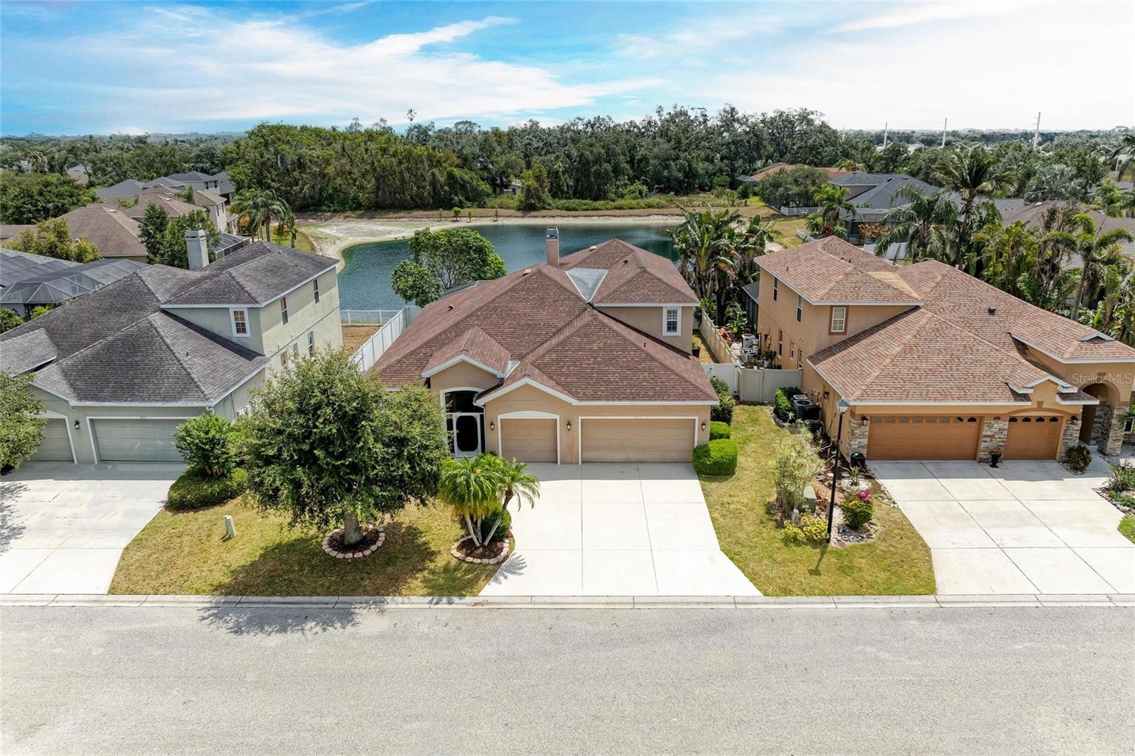 Beautifully appointed 5-bedroom, 4-bath pool home located in the sought-after Highland Ridge community of East Bradenton. Offering the perfect blend of space, style and functionality, this home is ideal for families or those who love to entertain. Step inside to a bright, open-concept layout with soaring ceilings, multiple living areas and stylish finishes throughout and is perfect for hosting gatherings or enjoying quiet evenings at home. The expansive primary suite features a luxurious en-suite bath, dual vanities and a walk-in closet. Additional bedrooms provide plenty of room for guests, home offices or flex space. With 4 full baths, everyone enjoys convenience and privacy. Outside, unwind in your private backyard oasis featuring a sparkling pool, covered lanai and lush landscaping—ideal for year-round Florida living. Highland Ridge is a quiet, well-maintained neighborhood close to top-rated schools, shopping, dining and just a short drive to Gulf beaches. Don’t miss this opportunity to own a spacious, move-in ready home in one of East Bradenton’s most desirable communities.