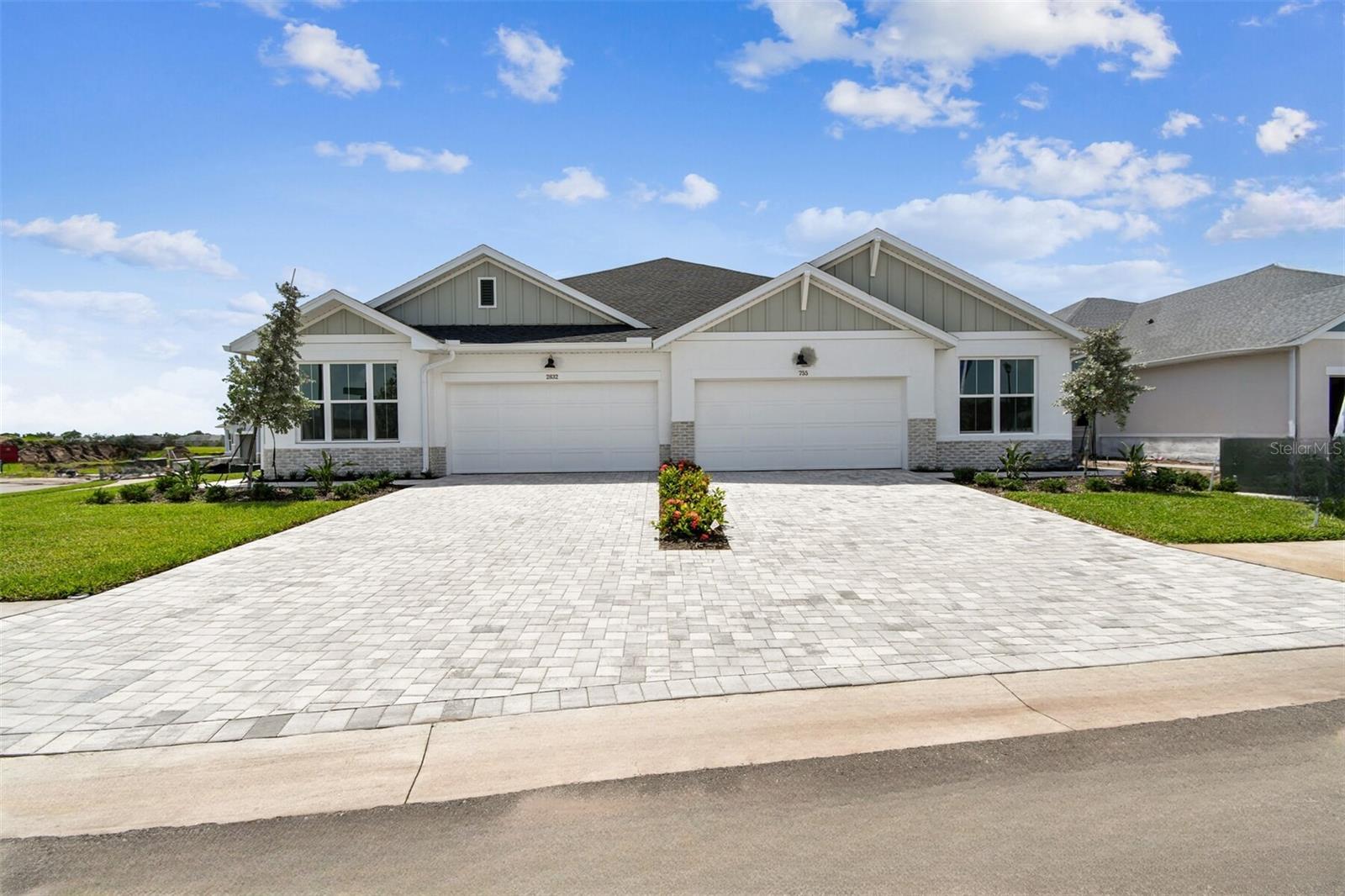 One or more photo(s) has been virtually staged. Under Construction. Discover the Alanson floor plan by David Weekley Homes, a beautifully designed single-story paired villa in the Gracewater community of Sarasota, FL. This 2-bedroom, 2-bathroom home offers a thoughtful blend of comfort and style, featuring an enclosed study with elegant French doors—perfect for a home office or cozy retreat. The designer kitchen is a chef’s dream, boasting a premium cooktop, carefully curated designer finishes, and an open-concept layout that flows seamlessly into the dining and family spaces. Large windows fill the home with natural light, leading to a breezy lanai, ideal for outdoor relaxation and entertaining. The Owner’s Retreat is a serene sanctuary, complete with a spa-like en suite bath and a spacious walk-in closet. A private guest bedroom with an adjacent bath ensures comfort for visitors. Enjoy a low-maintenance lifestyle with included lawn care and access to resort-style amenities, all in a prime location near Sarasota’s best shopping, dining, and stunning Gulf Coast beaches. Contact the Gracewater team today to learn more about making the Alanson your dream home!
**Purchase a select David Weekley Quick Move-in Home in the Tampa, Manatee and Sarasota area from July 1-31, 2025, qualified buyers may be eligible for mortgage financing at a 4.99% interest rate (5.036% APR for conventional loans, 5.733% APR for FHA and VA loans) mortgage loan. Homes must close by September 1, 2025.