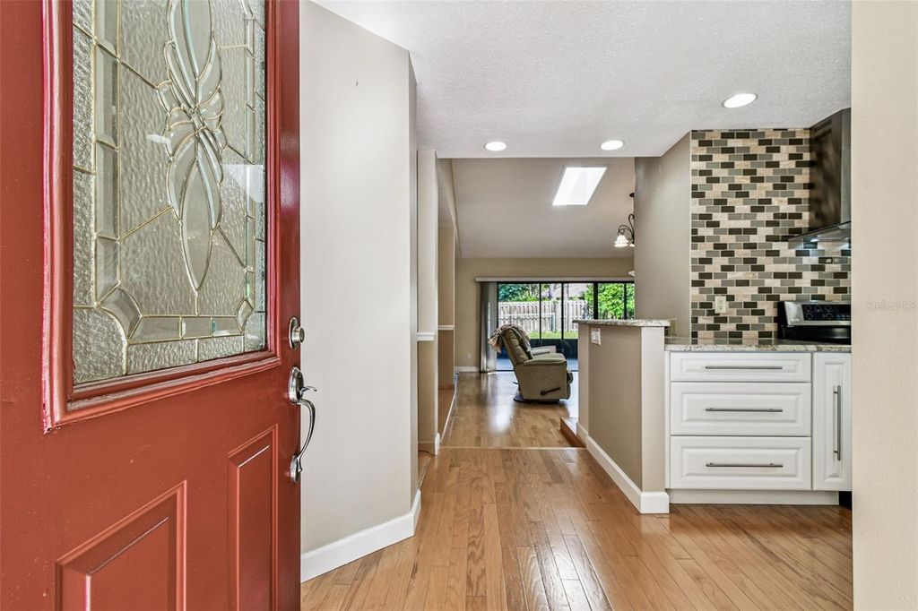 Photo of 765 Sandy Hook Road, Palm Harbor, FL 34683 (MLS # TB8439768)