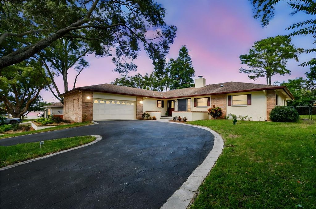 Photo of 765 Sandy Hook Road, Palm Harbor, FL 34683 (MLS # TB8439768)