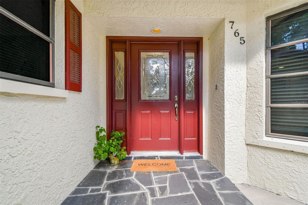 Photo of 765 Sandy Hook Road, Palm Harbor, FL 34683 (MLS # TB8439768)