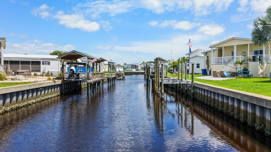 Photo of 116 W Saint Johns Way, Apollo Beach, FL 33572 (MLS # TB8544936)