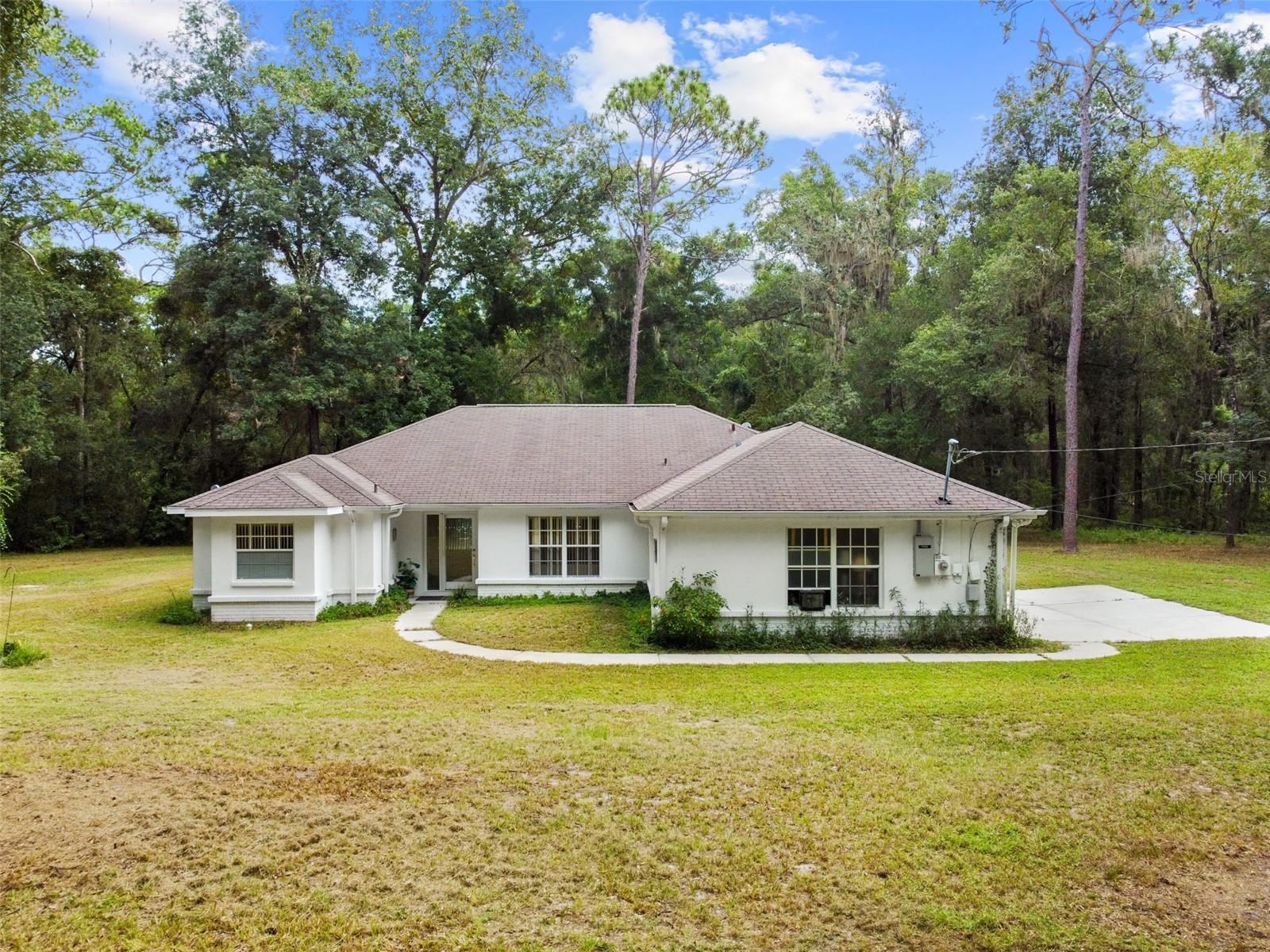 Bring your vision to this solid block home featuring 3 bedrooms, 2 baths, and a sparkling in-ground pool — all set on 2.5 fully fenced acres. The home offers a comfortable layout with plenty of natural light and endless potential to add your personal touch. Outside, you’ll find wide-open space for animals, gardens, or simply enjoying the peace of country living. Plus, a whole-house Generac generator provides extra peace of mind. With strong bones, land to spread out, and room for updates, this property is the perfect blend of opportunity and lifestyle.