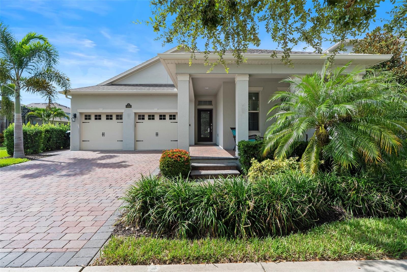 Welcome to Your Own Slice of Paradise in Waterleigh! This one-story bungalow pool home is perfectly positioned on a tranquil pond with a sparkling water fountain—and yes, you can even catch nightly sounds of the Disney fireworks right from your own backyard or take a short walk to catch the view! Offering 4 spacious bedrooms and 3 full baths, fully owned solar panels for entire home, and whole home water softner system this home features an open layout, a walk-in laundry room, and a 2-car garage for added convenience. The screened-in, solar-heated pool creates the ultimate indoor-outdoor Florida lifestyle—perfect for relaxing evenings or entertaining guests. The primary suite is a peaceful retreat with a walk-in closet and serene pond views. Located in the highly sought-after Waterleigh community, enjoy resort-style living with access to clubhouses, multiple pools, tennis courts, walking trails, a community dock, and more. Zoned for top-rated schools including the new Atwater Bay Elementary, Water Spring Middle School, and Horizon High School. Just 5 minutes to local grocery stores and dining, and only 20 minutes from the magic of Disney, this home is the perfect blend of convenience, community, and charm.