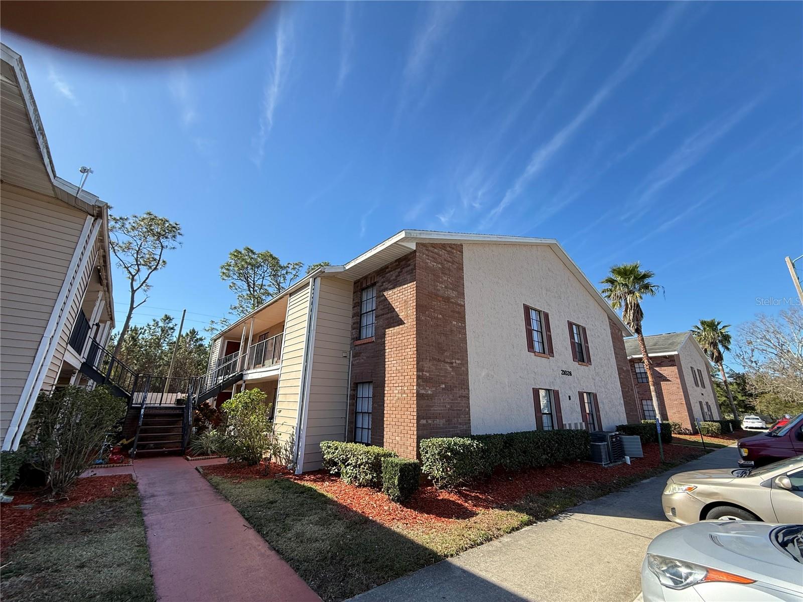 Move in Ready Second Floor Condo with Private Laundry room, brand new Dish washer, water heater, Stackable washer/Dryer. Newly remodeled with newer AC system, Luxury Vinyl flooring and Appliances. Community just got new roof installed and offers pool, Club house, Playground, with excess open parking lots for residents. Conveniently located close to US 41, easy access to Hillsborough, Pinellas and Hernando Counties. HOA monthly fee of $299 covers water, Sewer, Trash, and all external maintenance and swimming pool. Property is in Zone X and Flood insurance is not required. Condo documents and disclosures are attached on MLS.