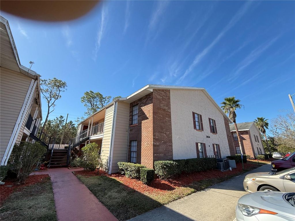 Photo of 21026 Voyager Boulevard #6, Land O Lakes, FL 34638 (MLS # TB8412205)