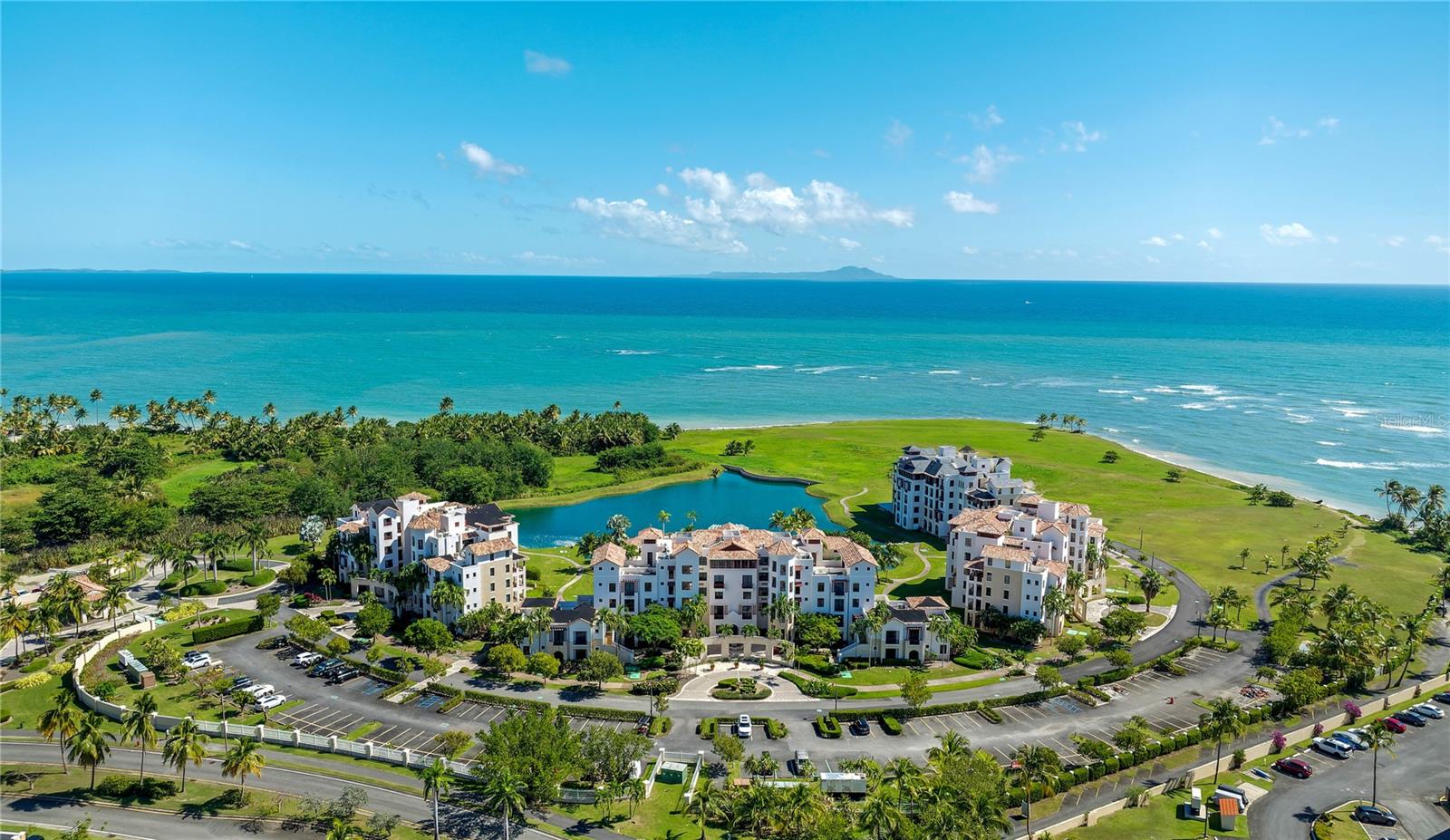 No expense has been spared creating this jewel box dwelling, which is being offered completely turnkey, including all imported furnishings, rugs, selected art, as well as full kitchen and dining accoutrements. Purchased in late 2016 and followed by a 3.5 year complete renovation costing more than $2 million. In addition to being professionally decorated, this smart home includes Hunter Douglas electric blinds, lights, Nest thermostats, U-Moen double shower controller, WiFi oven control, hidden camera surveillance, remote screen and storm shutters, doorbell including camera and voice by Cloud-edge and August WiFi deadbolt remote access. The unit features a protected ocean front by natural reefs, with glorious open views across a private garden, freshwater pond and sea. This luxurious home is entered through a custom, handcrafted 2 1/2-inch thick steel core door with rosewood shroud, set over an ipe (ironwood) threshold. General Features: double-paned windows and patio doors, Argon gas-filled, Belgian hurricane glass; electric storm shutters; custom cedar wainscotting, millwork, built-ins and trim; Farrow & Ball wallpaper accents; ceilings range from 9-10’ with level 4 and 5 surface finishes; interior doors custom-made solid cedar, 8’ high, 1 ¾“ thick, with custom Italian magnetic retractable latch hardware in brushed nickel; solid cedar built-in storages; central air conditioning, two zones, whisper quiet with fully insulated hard ducting, HVAC supply and return grills are custom-made cedar louvered attached with neodymium magnets; whole-home, water filtration and softener system, unlimited instant hot water; hardwired 1 Gig Wi-Fi nodes throughout; lead-lined walls for sound and emf proofing; built in and hidden surveillance accessible via wifi; remote electric August door lock and Cloud Edge doorbell; imported stone countertops from Italy, Turkey and Kashmir; drawers and cabinet doors throughout home are soft-close or push to open, Blum hardware; handmade Spanish backsplash tiles; double drawer refrigerators, four door full size refrigerator and wine fridge; Thermador Induction cook top with retracting wolf venting system, double drawer fisher paykal dishwasher and double oven with wifi, motion activated faucet; remote vent motors for silent exhaust, kitchen, bathrooms and laundry rooms; kitchen pantry, and outdoor buffet area finished in matching Italian marble, fully loaded with chef’s kitchen appliances; serving sets and flatware from Williams and Sonoma, full set of pots/pans, mixing bowls, blenders, food processors, bakeware, drinking glasses, setting for 8; Dimplex Optimist Fireplace, the only one in the Caribbean, above this feature is a one-way mirror hiding built in television, smart controllers and sound system; two guest bedrooms with large windows, double closets with cedar doors, with separate guest bathroom across hallway, in addition to half bath and master; primary suite has walk-in closet, four levels of back lighting, shoe and purse displays, hanging space and chandelier; suite also includes two built-in double wardrobe closets and matching dressers, additional shoe closet display in hallway; master bath with double u-moen digital wifi shower, dual sinks with massive cabinet space; covered patio, cedar planked ceiling, electric sunscreens, maxwell fans; comprehensive drainage and water management system, including programmable sprinkler and private lush garden oasis with lighting. A one of a kind home in the Caribbean.