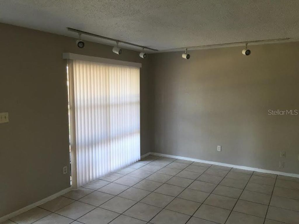 Photo of 5216 Palisades Drive, Orlando, FL 32808 (MLS # O6398049)