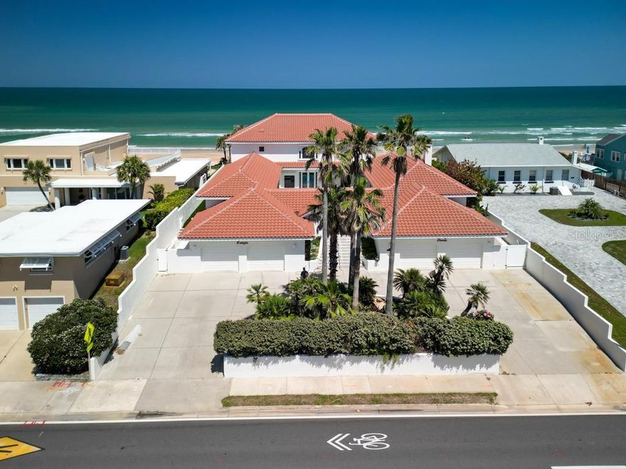 You can hear the waves anywhere on the oceanfront but only the most encapsulating settings make you listen. Designed with full scale modern luxury in mind, turnkey features of this home have been designed with style and comfort at the forefront of its modernization. Experience panoramic ocean views throughout the majority of the 5967sqft of living space. Enjoy a chef's kitchen with Wolf induction range, 36”oven and steam oven, Miele dishwasher and coffee station, Subzero refrigerator, wine fridge, built in Wolf microwave, Brezio faucets and pot filler. New roof, all new AC’s with blue light and Epic Air purification, new electrical panels, upgraded water line to 1.5", CAT 6 wiring throughout entire home, buried propane tank for gas fireplace and outdoor kitchen, wind rated windows and storm shutters throughout, whole home security system with mobile device capability, central vacuum, and surround sound in living room. All bedrooms, bathrooms and kitchen have been renovated top to bottom including all fixtures, vanities, showers/tubs, tile, and doors. New outdoor poolside kitchen with marine grade stainless steel exhaust and appliances. Additional interior finishes include 5 1/8" base boards throughout, new chandeliers with electric lowering capability, wall sconces, ceiling lighting, new open concept staircase, new Tremco under east deck to prevent excess moisture, and much more. All on 100 feet of beach frontage with endless views and serenity. Contact your local agent for entire list of upgrades and improvements, the list will amaze you.