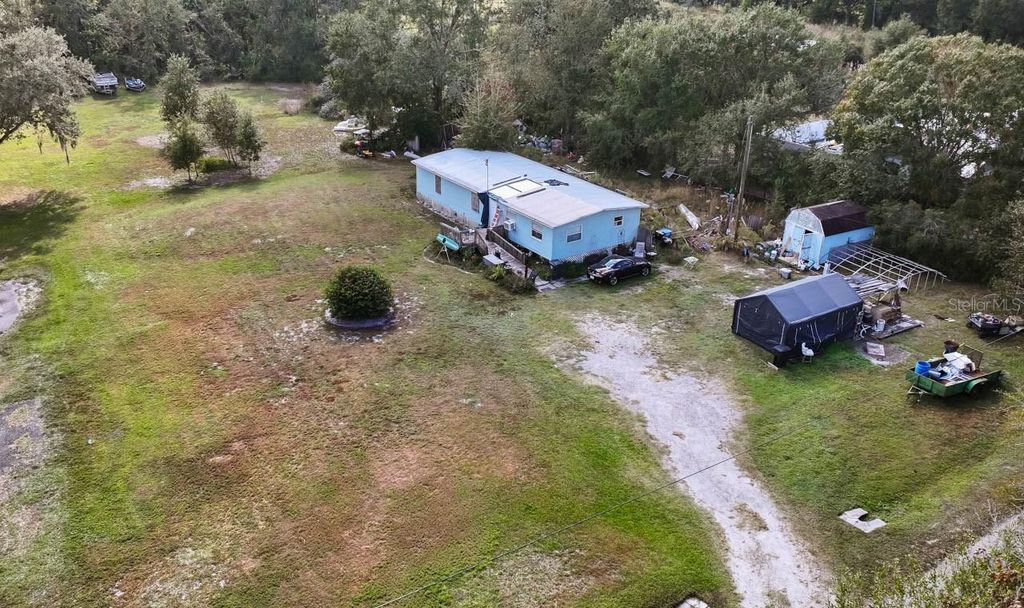 Photo of 10625 Broken Arrow Drive, Thonotosassa, FL 33592 (MLS # TB8451451)