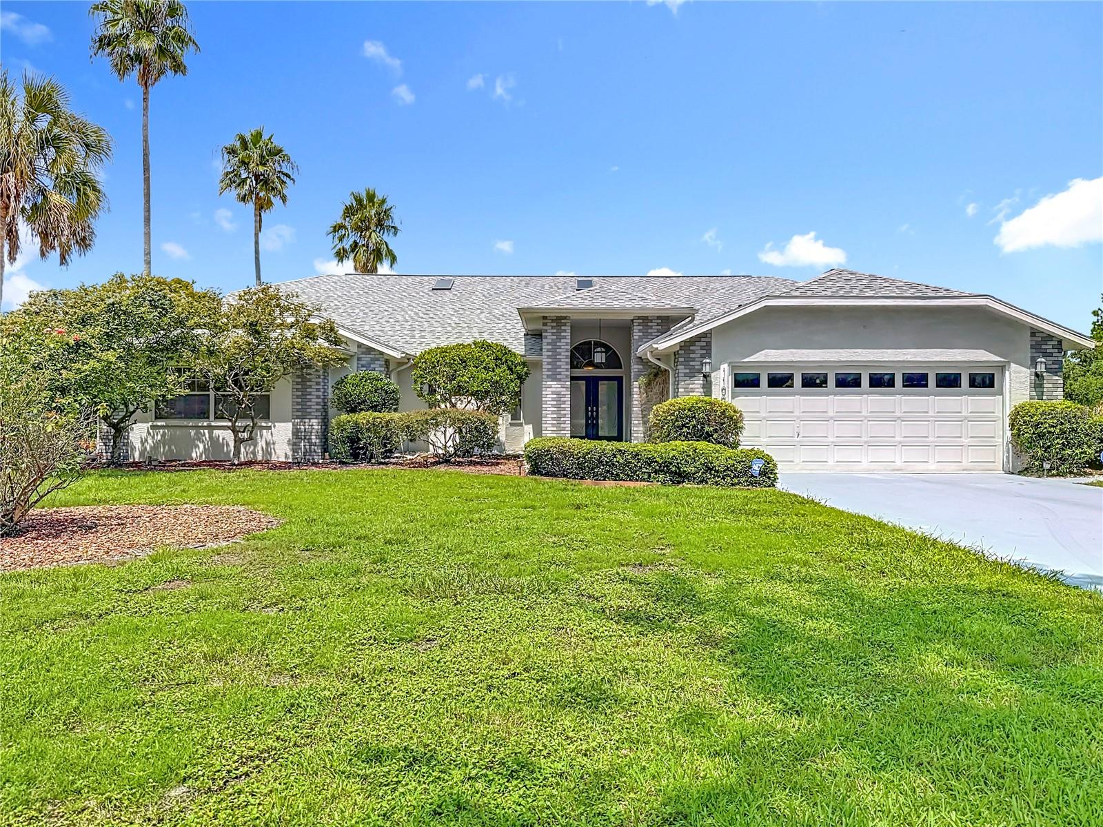 Welcome to Woodland Waters! This stunning lakefront pool home sits on over 1 acre and offers breathtaking views. Featuring 3 bedrooms, 2.5 baths, a 2-car garage, and a private office, this residence blends elegance and functionality. The inviting dual-door entry opens to soaring vaulted ceilings, a spacious great room, family room, den, and formal dining. Crushed shell flooring flows throughout, adding unique charm. The chef’s kitchen showcases granite counters, stainless steel appliances, gas stove, double oven, breakfast bar, dining nook, and walk-in pantries. The primary suite includes a sitting area, walk-in closet with organizers, jetted tub, separate shower, and dual granite vanities. Extras include central vacuum, French doors, pocket sliders, ceiling fans, and abundant storage. Outdoors, enjoy a sparkling pool with pool bath, open patio, gazebo, irrigation well, and a shed with electric and water—all in a private, park-like setting. A dock has already been permitted, and the Woodland Waters community offers tennis and pickle ball courts for your outdoor pleasures! The furniture and decorations are also available for purchase. Make your appointment today!