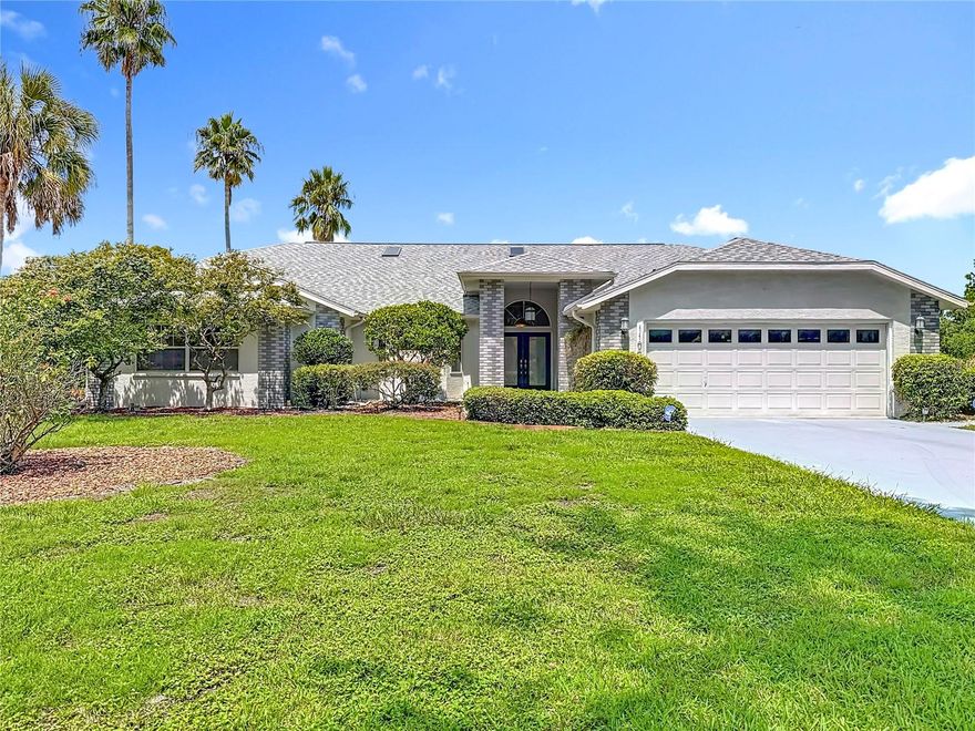 Welcome to Woodland Waters! This stunning lakefront pool home sits on over 1 acre and offers breathtaking views. Featuring 3 bedrooms, 2.5 baths, a 2-car garage, and a private office, this residence blends elegance and functionality. The inviting dual-door entry opens to soaring vaulted ceilings, a spacious great room, family room, den, and formal dining. Crushed shell flooring flows throughout, adding unique charm. The chef’s kitchen showcases granite counters, stainless steel appliances, gas stove, double oven, breakfast bar, dining nook, and walk-in pantries. The primary suite includes a sitting area, walk-in closet with organizers, jetted tub, separate shower, and dual granite vanities. Extras include central vacuum, French doors, pocket sliders, ceiling fans, and abundant storage. Outdoors, enjoy a sparkling pool with pool bath, open patio, gazebo, irrigation well, and a shed with electric and water—all in a private, park-like setting. A dock has already been permitted, and the Woodland Waters community offers tennis and pickle ball courts for your outdoor pleasures!  The furniture and decorations are also available for purchase. Make your appointment today!