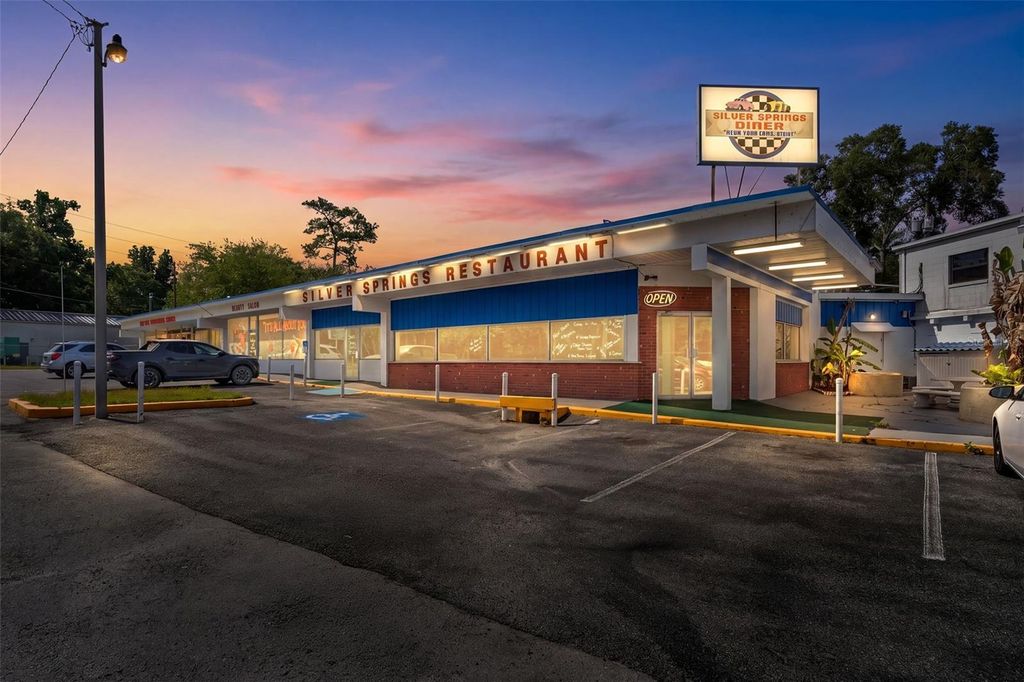 Photo of 5300 E Silver Springs Boulevard #B, Silver Springs, FL 34488 (MLS # OM724283)
