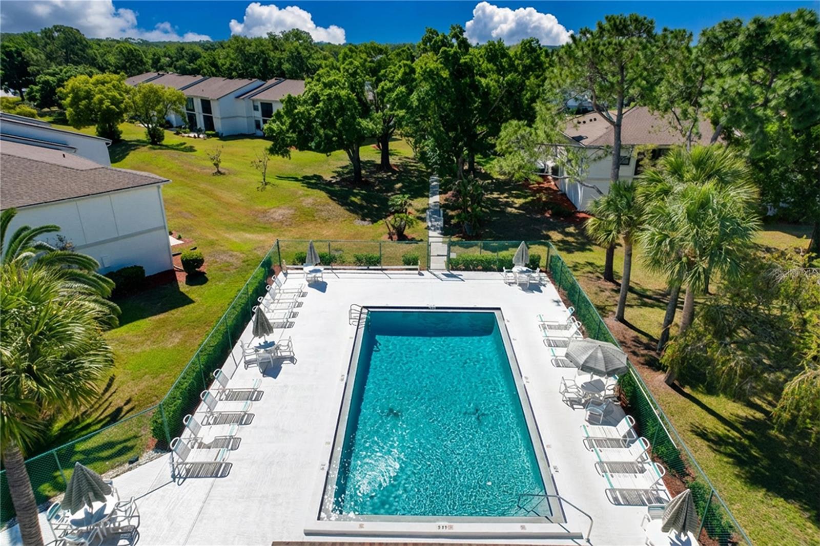MEADOWS CONDO UNIT TWO AT EAST LAKE WOODLANDS THE - Residential