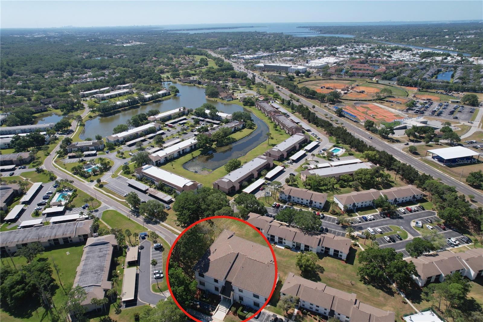 MEADOWS CONDO UNIT TWO AT EAST LAKE WOODLANDS THE - Residential