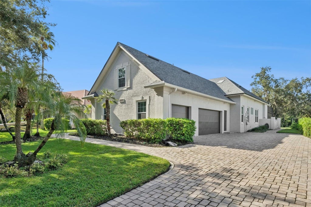 Photo of 3832 Hunters Isle Drive, Orlando, FL 32837 (MLS # O6445848)