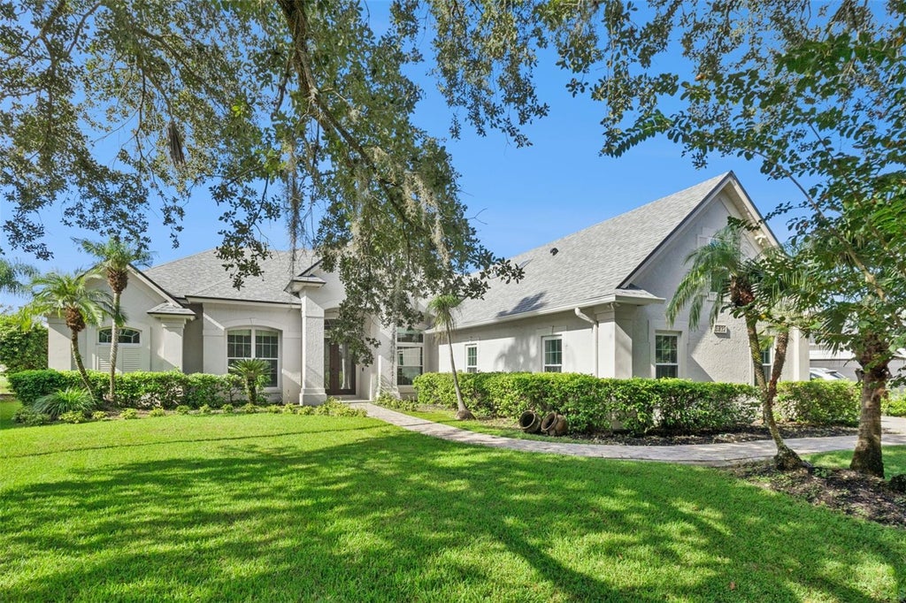 Photo of 3832 Hunters Isle Drive, Orlando, FL 32837 (MLS # O6445848)