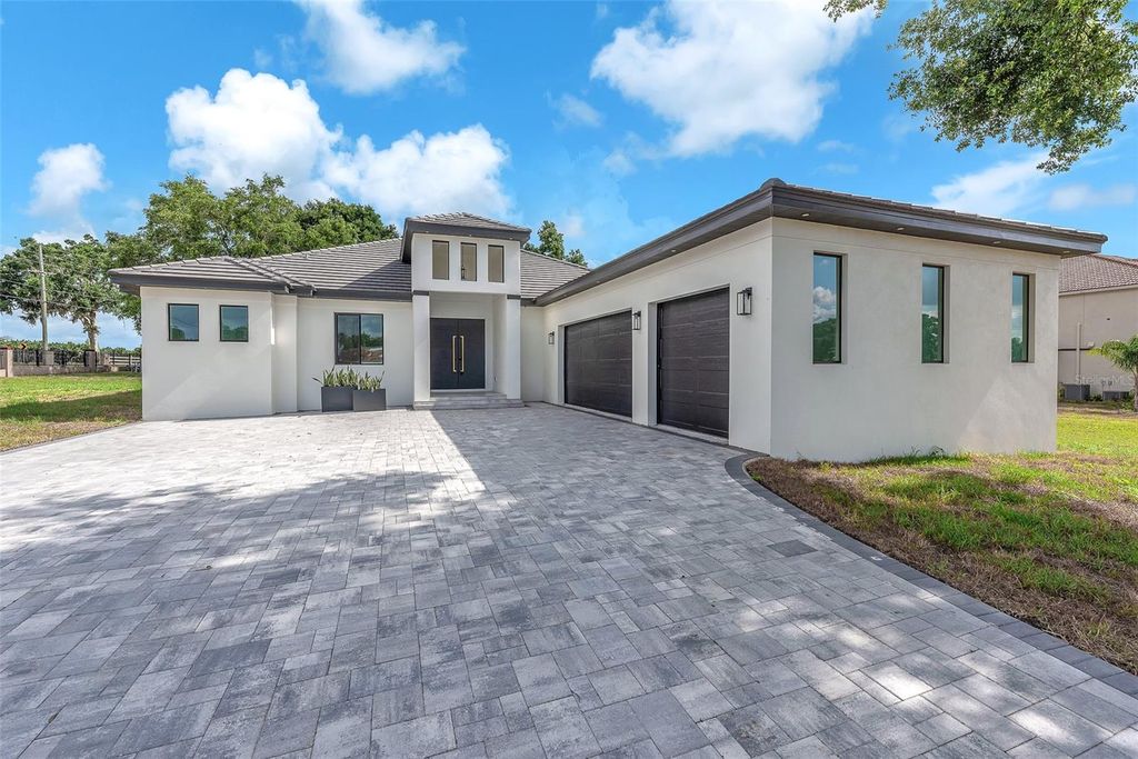 Photo of 11921 Fort King Highway, Thonotosassa, FL 33592 (MLS # TB8456613)