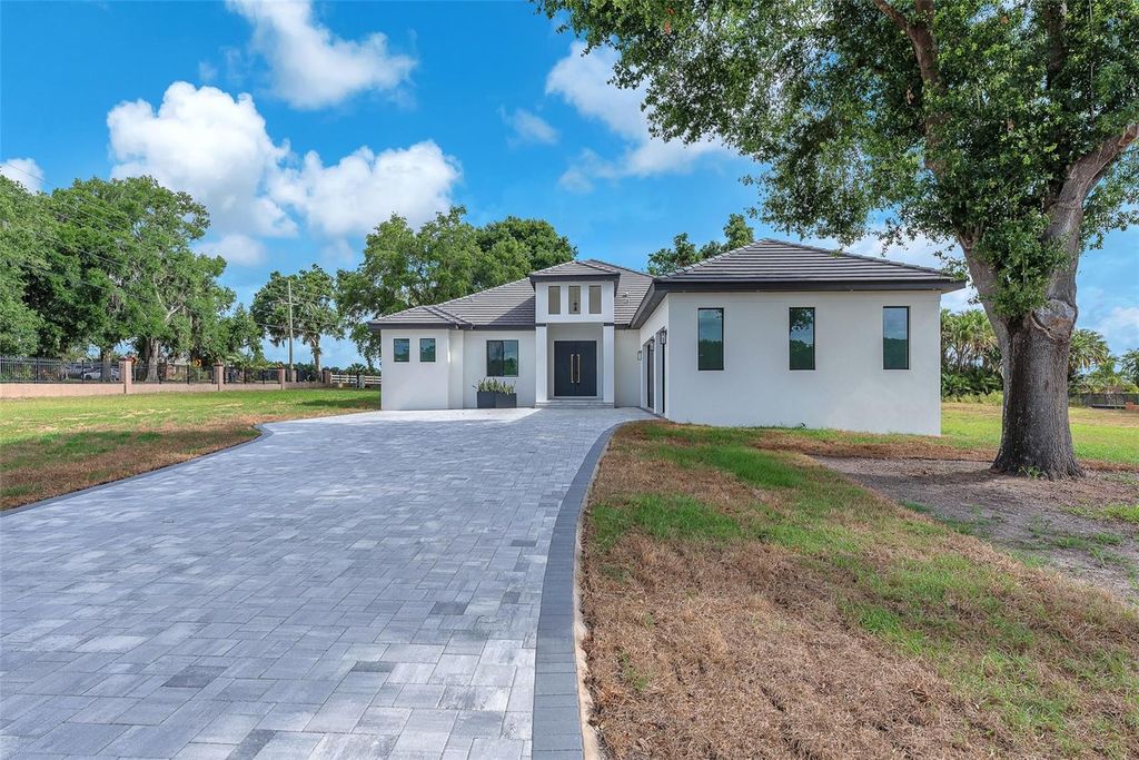 Photo of 11921 Fort King Highway, Thonotosassa, FL 33592 (MLS # TB8456613)