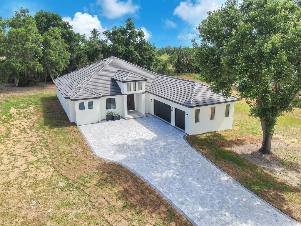 Photo of 11921 Fort King Highway, Thonotosassa, FL 33592 (MLS # TB8456613)