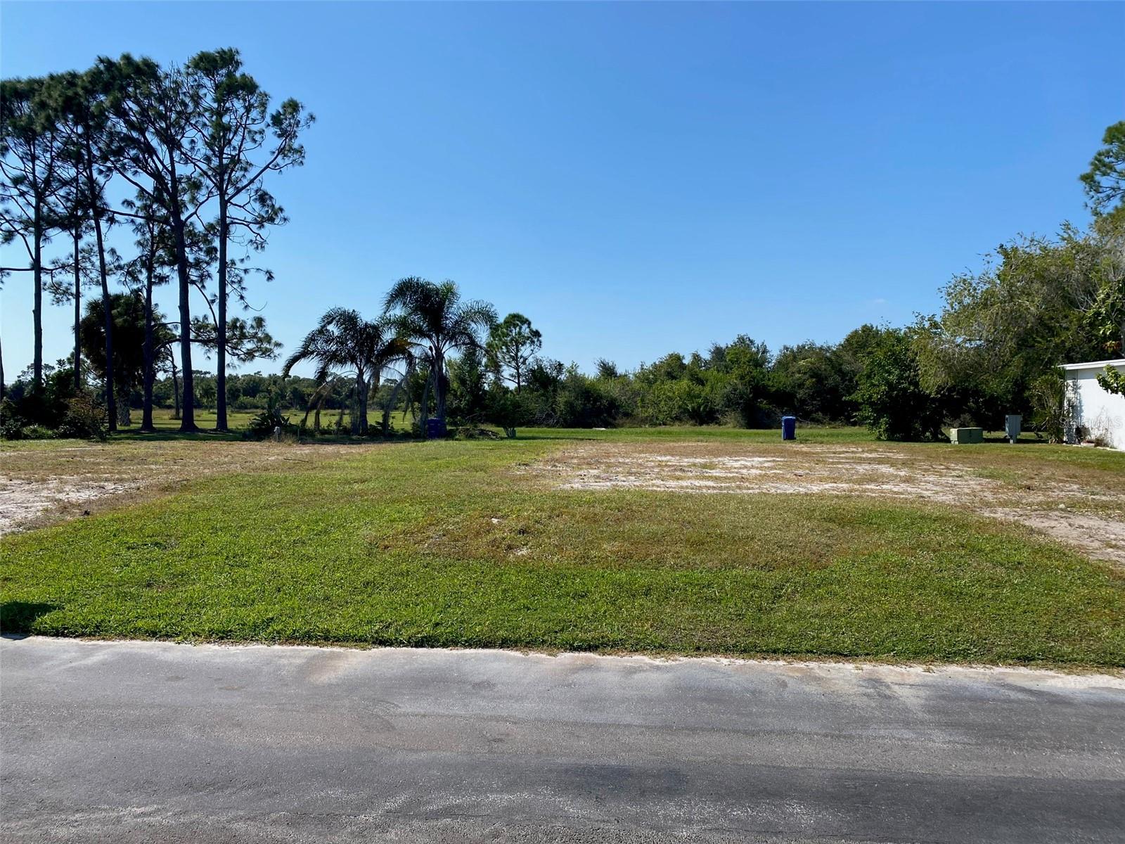 A Resident Owned Community Just for Persons 55+. The Ultimate Lifestyle on Florida’s Gulf Coast located between Sarasota and Fort Myers with boat access to the Gulf. Welcome To the Good Life! RECREATION, 2 Clubhouses, 2 Heated Pools. There is no shortage of activities in this community! Vacant Lot located in the Pet Section and backs up to 40 acres of undevelped land. Bring in your new home and being enjoying the lifestyle you have earned!